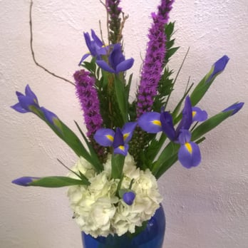 Ribbons & Roses - white hydrangea with blue iris and liatris in a blue vase. - Florists Near Me - Gothenburg, Nebraska Ribbons & Roses - white hydrangea with blue iris and liatris in a blue vase. - Florists Near Me - Gothenburg, Nebraska