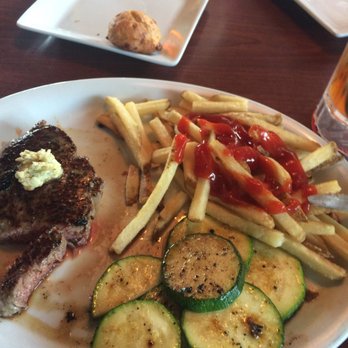 Ruby Tuesday - Petite sirloin, French fries, and zucchini - Burgers Near Me - Gulf Breeze, Florida