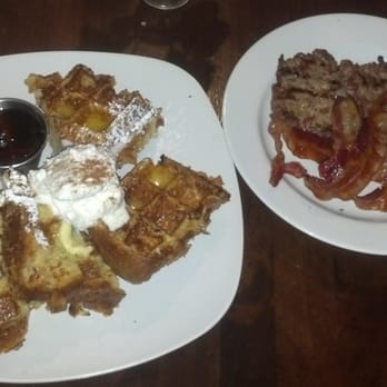 Iron Roost - French Toast Waffle w/ side of Bacon and Pork Sausage - Breakfast & Brunch Near Me - Ballston Spa, New York Iron Roost - French Toast Waffle w/ side of Bacon and Pork Sausage - Breakfast & Brunch Near Me - Ballston Spa, New York
