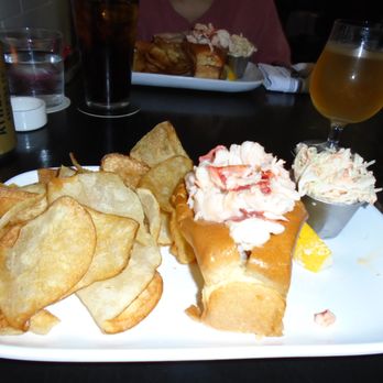 Row 34 - Seaport - Buttered Lobster Roll with House-made Chips and cole slaw - New American Near Me - Boston, Massachusetts