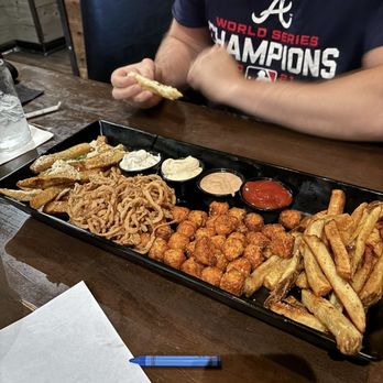 Stockyard Burgers & Bones - Fry board. Tastes even better than it looks. - American Near Me - Atlanta, Georgia Stockyard Burgers & Bones - Fry board. Tastes even better than it looks. - American Near Me - Atlanta, Georgia