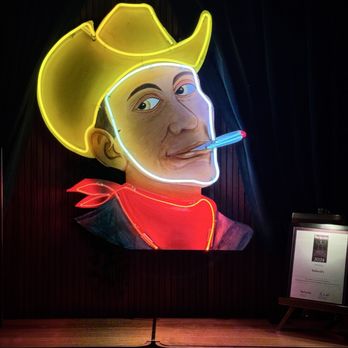 Stillwell's - Neon Cowboy as soon as you exit the elevators to let you know you've arrived - Steakhouses Near Me - Dallas, Texas Stillwell's - Neon Cowboy as soon as you exit the elevators to let you know you've arrived - Steakhouses Near Me - Dallas, Texas