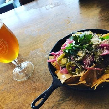 Ballast Point Brewing Long Beach - Steak nachos and Sculpin IPA - Breweries Near Me - Long Beach, California