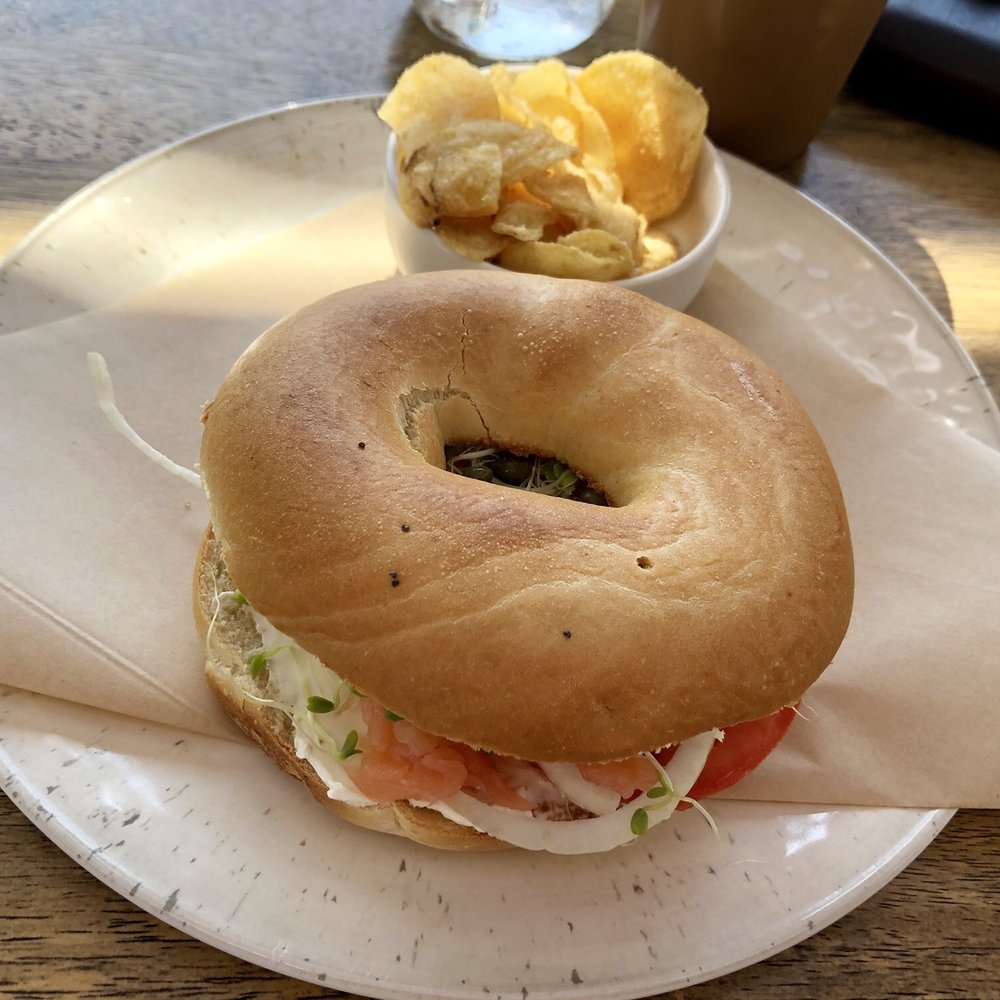 Lava Java Coffee Roasters of Maui - The salmon bagel with cream cheese, onion, tomatoes and capers. The perfect pairing to a delicious cup of coffee. - Coffee & Tea Near Me - Kihei, Hawaii Lava Java Coffee Roasters of Maui - The salmon bagel with cream cheese, onion, tomatoes and capers. The perfect pairing to a delicious cup of coffee. - Coffee & Tea Near Me - Kihei, Hawaii
