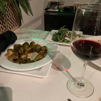 Blade 1936 - Mushy Brussels. Left over mound of arugula from the grilled Spanish octopus - Pizza Near Me - Oceanside, California