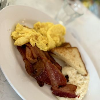 Willa's - Breakfast plate with bacon - the grits were the star  of this plate!! - New American Near Me - Tampa, Florida