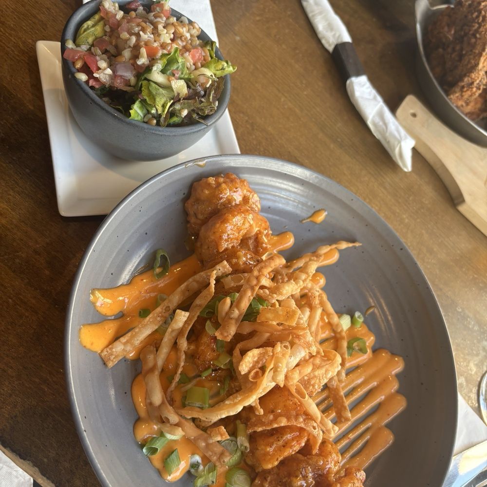 Grain - Bang bang shrimp appetizer w/ added side of grain, kale tomato, cucumber salad - Beer Gardens Near Me - Norfolk, Virginia
