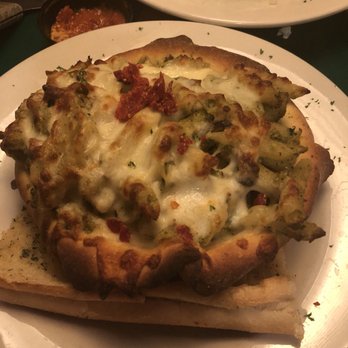 Oregano's - Pesto pasta bake with chicken in a hard as heck bread bowl. - Pizza Near Me - Glendale, Arizona Oregano's - Pesto pasta bake with chicken in a hard as heck bread bowl. - Pizza Near Me - Glendale, Arizona