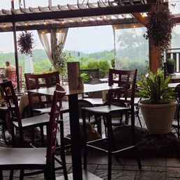 Looking out from the outside dining area. Not a nice sunny day, looks more like a rain forest but just nice overall Looking out from the outside dining area. Not a nice sunny day, looks more like a rain forest but just nice overall