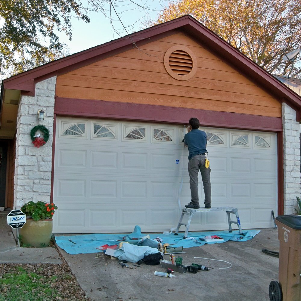 Do It Home Repair - Matt from Do It Home Repair, finishing the second coat of paint. He also added a gasket around the garage door. - Handyman Near Me