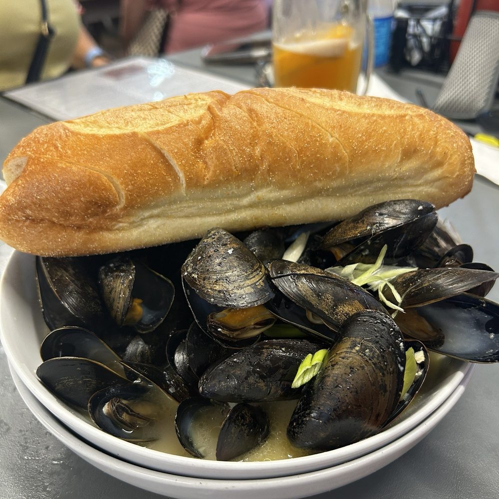 The Surfing Crab - Mussels with sour dough roll for dipping - yum! - Seafood Near Me - Lewes, Delaware The Surfing Crab - Mussels with sour dough roll for dipping - yum! - Seafood Near Me - Lewes, Delaware
