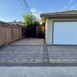 Solorio's Concrete - Stamped and colored concrete driveway.