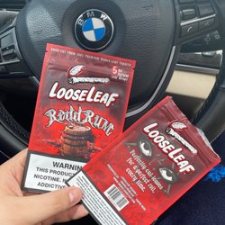 Lomita Smoke Shop - Redd rum looseleaf