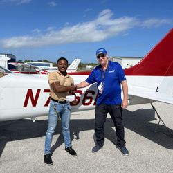 Melbourne Flight Training - Myself and Kurt after my checkride