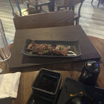 Kan Sushi - Cold kalbi that we waited 30 minutes for. - Sushi Bars Near Me - Honolulu, Hawaii