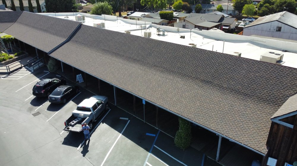 Slide of A-One Roof Management