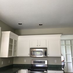 Xtreme Painting - Kitchen cabinets refinishing.