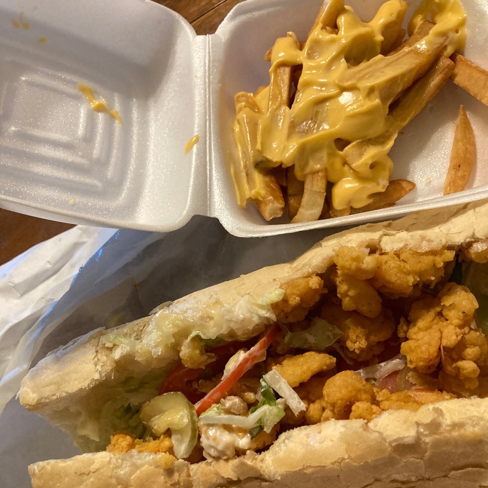 Shrimp po boy and cheese fries Shrimp po boy and cheese fries