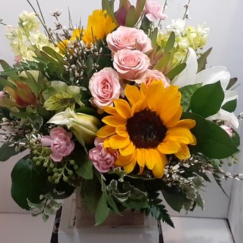 A White Lotus - Welcome home - Florists Near Me