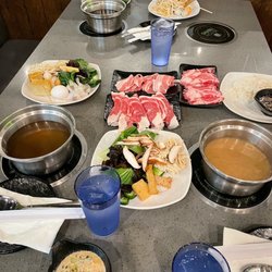 Shabu House - Hotpot time (shiro miso on the left and umami dashi on right)