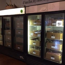 Adams Natural Meats - Meat selection inside refrigerators.
