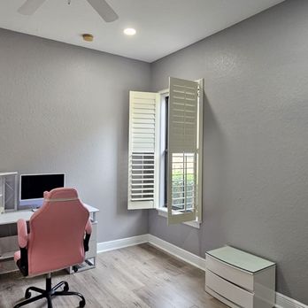 Supreme Painting Solutions - a room with a desk and a fan - Painters Near Me Supreme Painting Solutions - a room with a desk and a fan - Painters Near Me