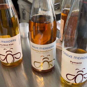 Crave Mead - three bottles of wine on a table - Meaderies Near Me - Blackstone, Massachusetts