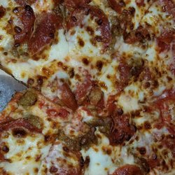 Papa Johns Pizza - Cheese, pepperoni and sausage.
