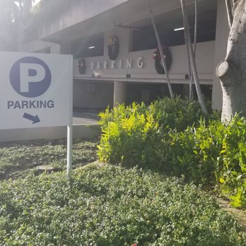 USCIS - Parking garage entrance from Pohukaina Street. - Public Services & Government Near Me - Honolulu, Hawaii USCIS - Parking garage entrance from Pohukaina Street. - Public Services & Government Near Me - Honolulu, Hawaii