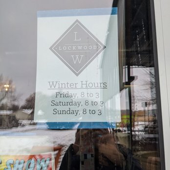 Lockwood Cafe - Winter hours - A window sign shows Lockwood Cafe's winter hours: Friday, Saturday, and Sunday from 8 am to 3 pm. - Cafes Near Me - Ames, Iowa