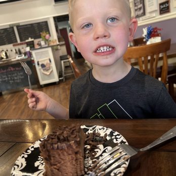 Beloved Cheesecakes - My son getting his chocolate cheesecake on! - Desserts Near Me - Canby, Oregon