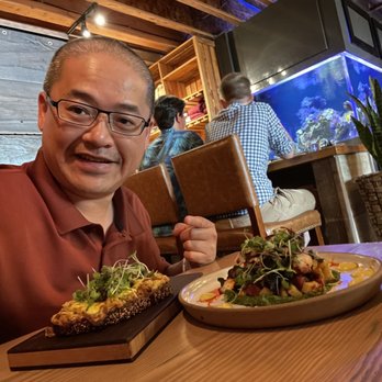 Lechon - Baked Dungeness Crab Toast and Grilled Octopus - Tapas Bars Near Me - Portland, Oregon Lechon - Baked Dungeness Crab Toast and Grilled Octopus - Tapas Bars Near Me - Portland, Oregon