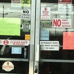 Fairdale Mini Mart - Signs on door say "No public or customer bathroom. This is you!"
