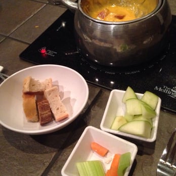 The Melting Pot - New Orleans cheddar with andouille sausage - Fondue Near Me - Arlington, Virginia The Melting Pot - New Orleans cheddar with andouille sausage - Fondue Near Me - Arlington, Virginia