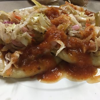 El Tropico - Pupusa with Curtido and tomato sauce - Mexican Near Me - Charlotte, North Carolina El Tropico - Pupusa with Curtido and tomato sauce - Mexican Near Me - Charlotte, North Carolina