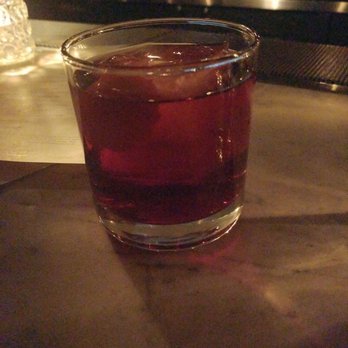 Model Citizen - a shot of a drink in a glass - Cocktail Bars Near Me - Calgary, Alberta Model Citizen - a shot of a drink in a glass - Cocktail Bars Near Me - Calgary, Alberta
