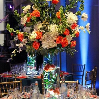 Grant and Jensen Floral Events - Table Centerpiece. The bottom part was also used as arrangements for ceremony aisles. - Wedding Planning Near Me Grant and Jensen Floral Events - Table Centerpiece. The bottom part was also used as arrangements for ceremony aisles. - Wedding Planning Near Me