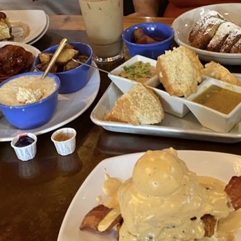 Biscuit Head - Left is pulled pork, grits, molasses bacon, home fries, flight of gravy, French toast biscuit, below Filthy Animal. - Cafes Near Me - Asheville, North Carolina Biscuit Head - Left is pulled pork, grits, molasses bacon, home fries, flight of gravy, French toast biscuit, below Filthy Animal. - Cafes Near Me - Asheville, North Carolina