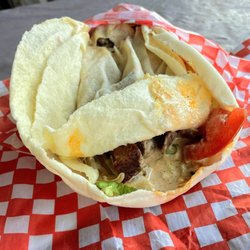 Falafel King Restaurant - Very poor beef wrap prior to disintegration, showing the weird chunks of spongy meat.