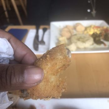Fusion East - Feathered chicken..... ewwwwwwwwww - Caribbean Near Me - Brooklyn, New York