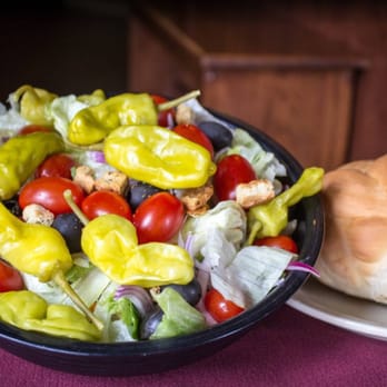 Italia Gardens - a bowl of salad and a loaf of bread - Italian Near Me - Oxford, Michigan Italia Gardens - a bowl of salad and a loaf of bread - Italian Near Me - Oxford, Michigan