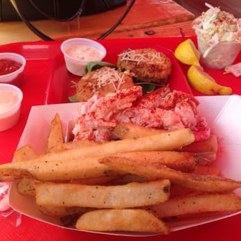 Claws - Lobster Roll Boat with Crab Cake appetizer. - Seafood Near Me - Rockland, Maine Claws - Lobster Roll Boat with Crab Cake appetizer. - Seafood Near Me - Rockland, Maine
