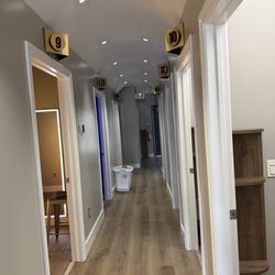 VIP Tanning Oxford - Half of the hallway of rooms
