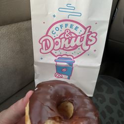 The Donut Palace - Glazed Chocolate Donut, my pick me up treat- puts a smile on my face. Fresh, sweet, & very tasty.