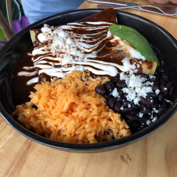 Spanglish NYC - Enchilada Tortilla Stuffed with chicken, Meixcan cheese, - Mexican Near Me - Bayside, New York Spanglish NYC - Enchilada Tortilla Stuffed with chicken, Meixcan cheese, - Mexican Near Me - Bayside, New York