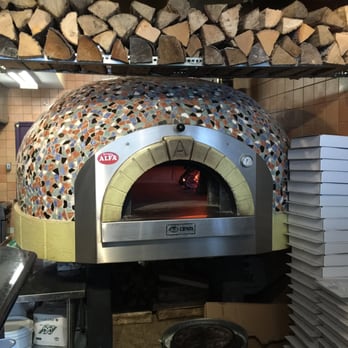 Pazza Pazza - the inside of a pizza oven - Pizza Near Me - York, Ontario Pazza Pazza - the inside of a pizza oven - Pizza Near Me - York, Ontario