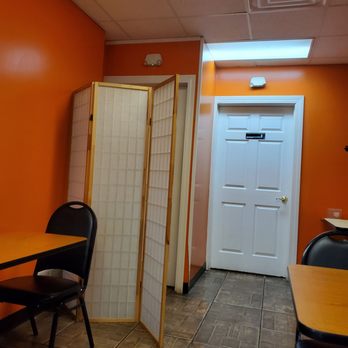 Jerusalem Restaurant - a room with a table and chairs - Halal Near Me - Peoria, Illinois