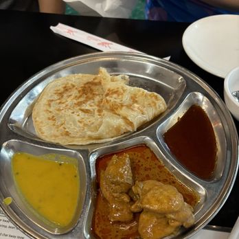 Mamak Malaysian Restaurant - R1. Roti Canai with Curry Chicken - Malaysian Near Me - Sugar Land, Texas Mamak Malaysian Restaurant - R1. Roti Canai with Curry Chicken - Malaysian Near Me - Sugar Land, Texas