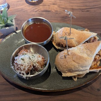 Eureka! Henderson - Pulled pork sandwich and a side of Mac and Cheese balls - American Near Me - Henderson, Nevada Eureka! Henderson - Pulled pork sandwich and a side of Mac and Cheese balls - American Near Me - Henderson, Nevada