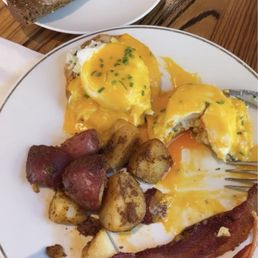 Eggs Benedict, potatoes, toast & bacon Eggs Benedict, potatoes, toast & bacon
